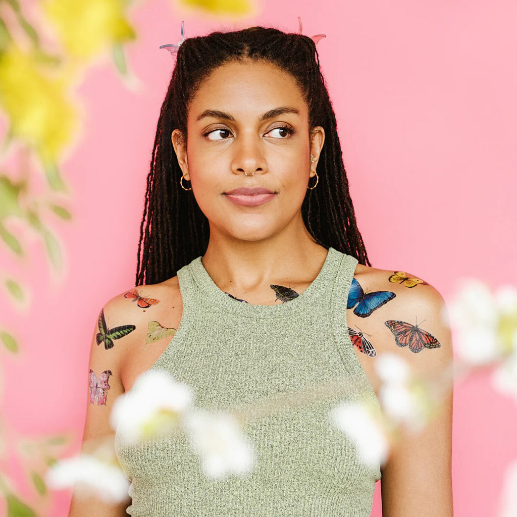 Tiny Butterflies on shoulder.