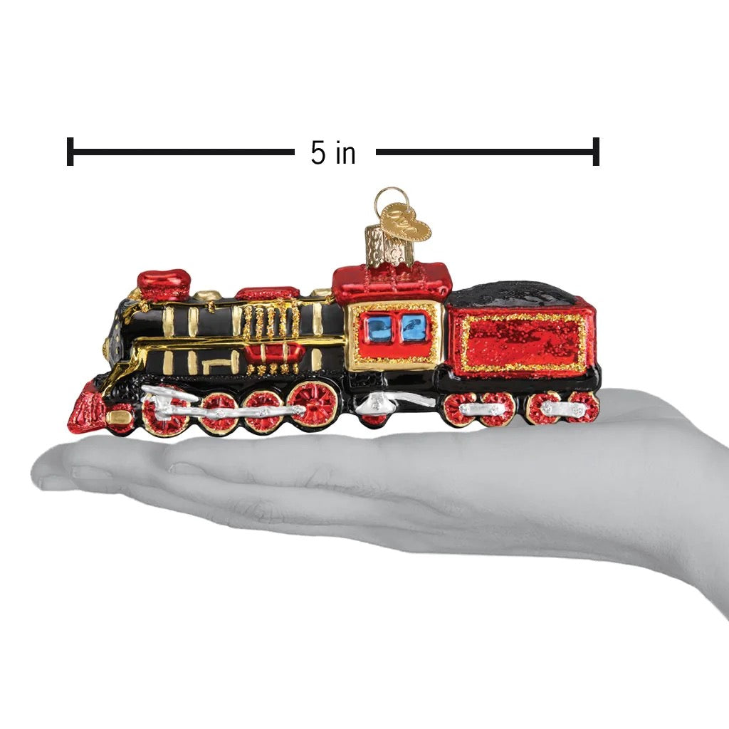 Train Ornament in hand.
