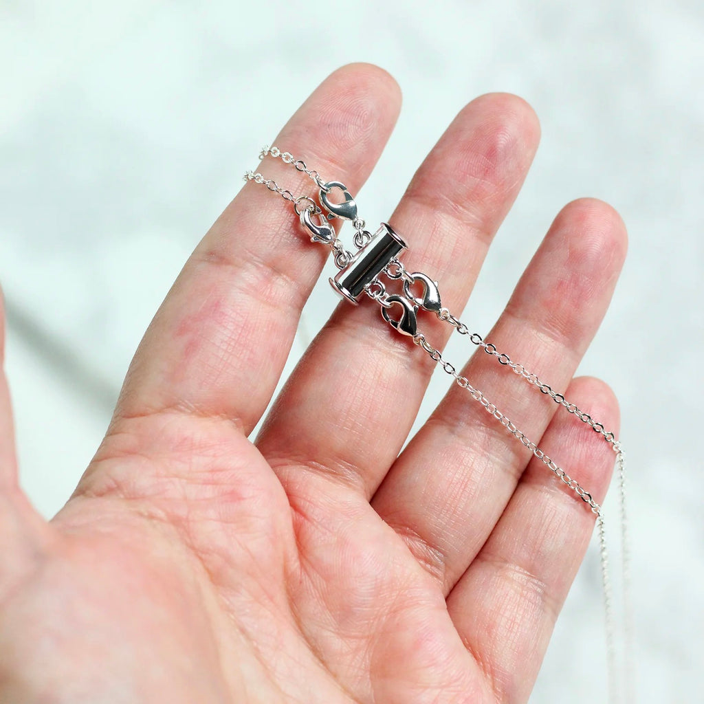 Two-Strand Necklace Spacer hand holding.