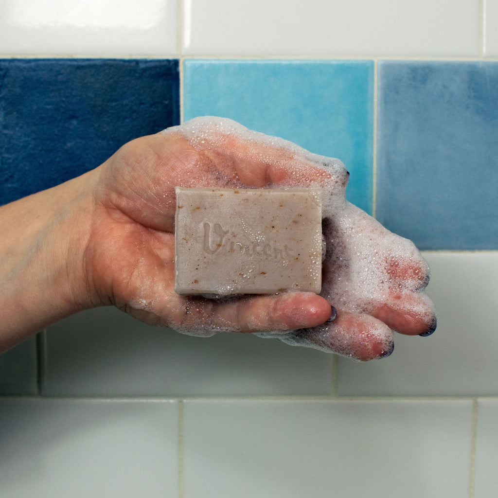 Van Gogh's Sunflower Soap in hand.