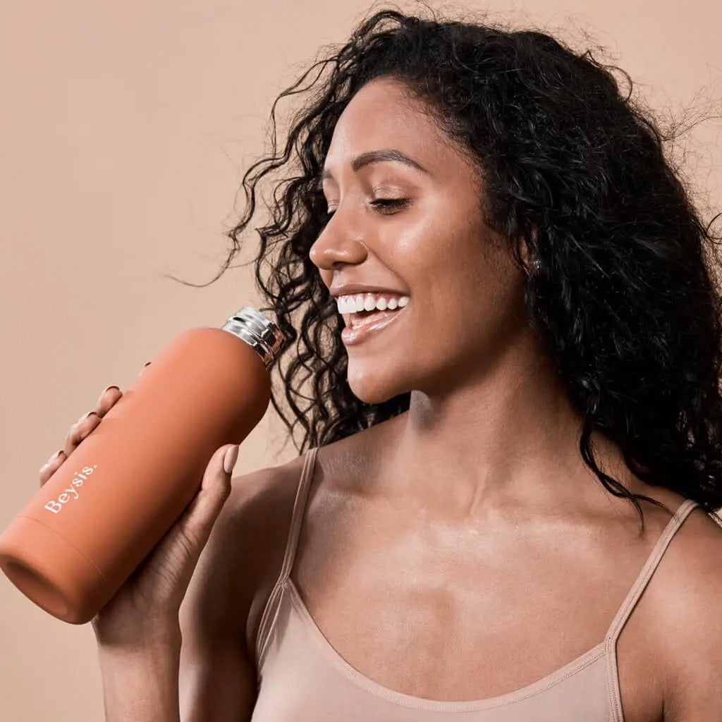 Woman with Matte Terracotta Bottle.