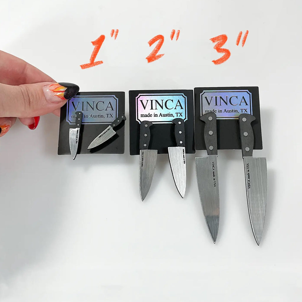 XL Knife Earrings size comparison.