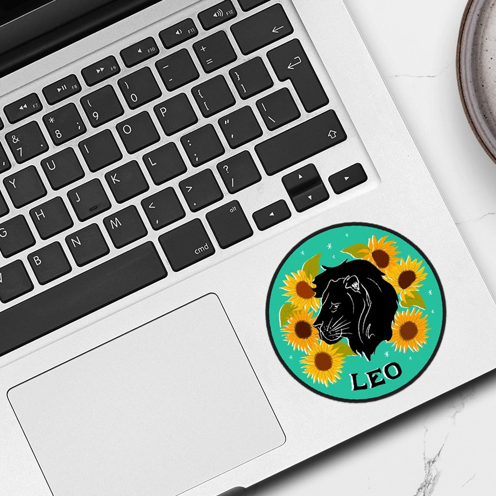 Zodiac Sticker: Leo on laptop.